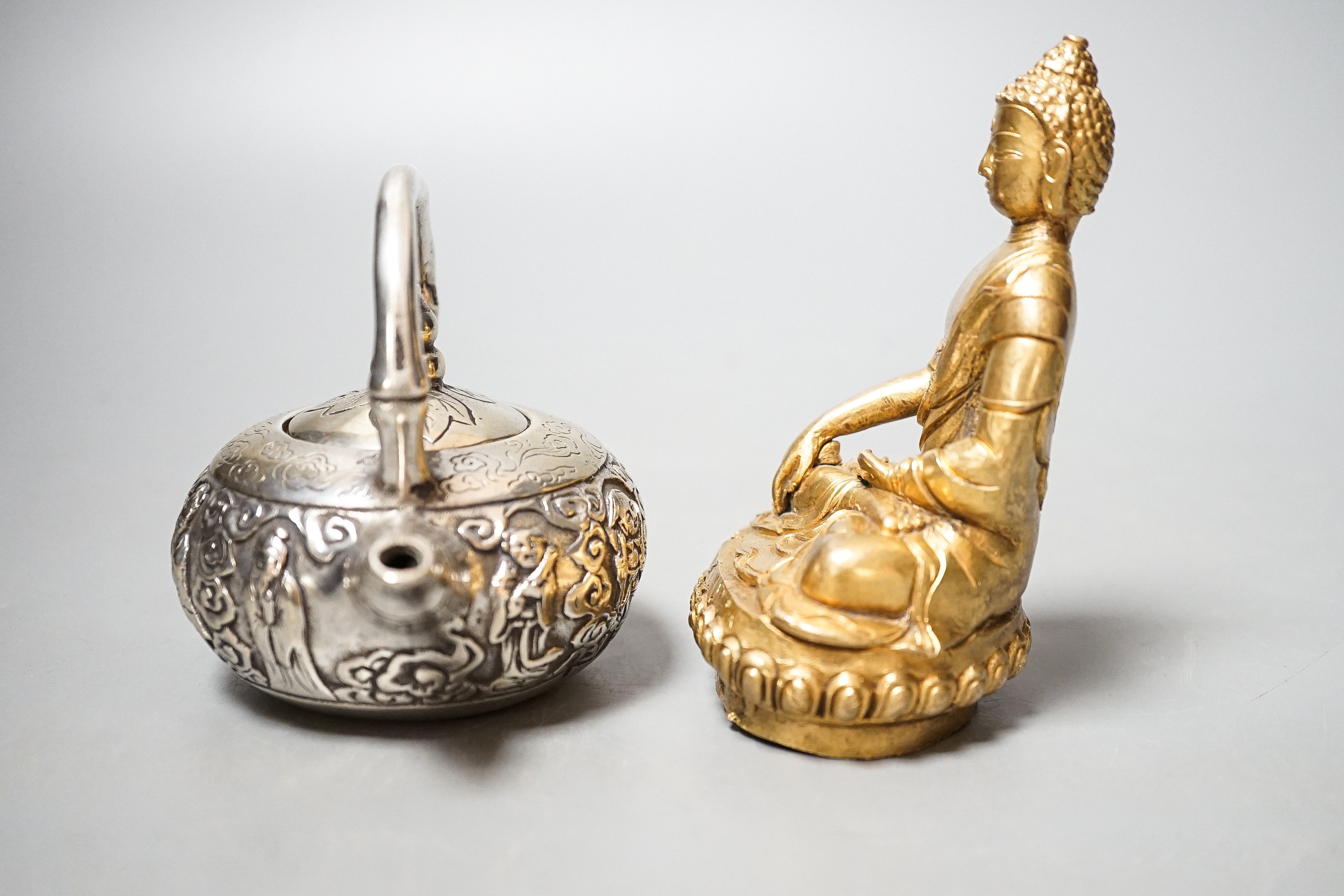 A Chinese gilt bronze buddha and a miniature plated teapot 11cm